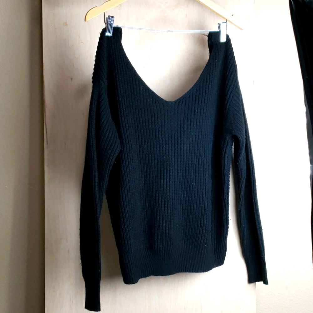 Cable knit knotted sweater
